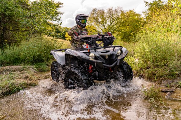 ATV driving through water